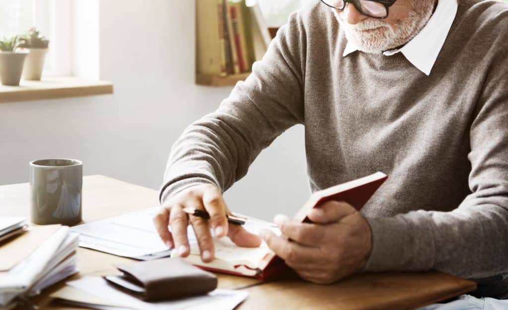 A 2026 Guide: How Much Does Assisted Living Cost? 1 Senior-Man-Planning-Assisted-Living-Costs