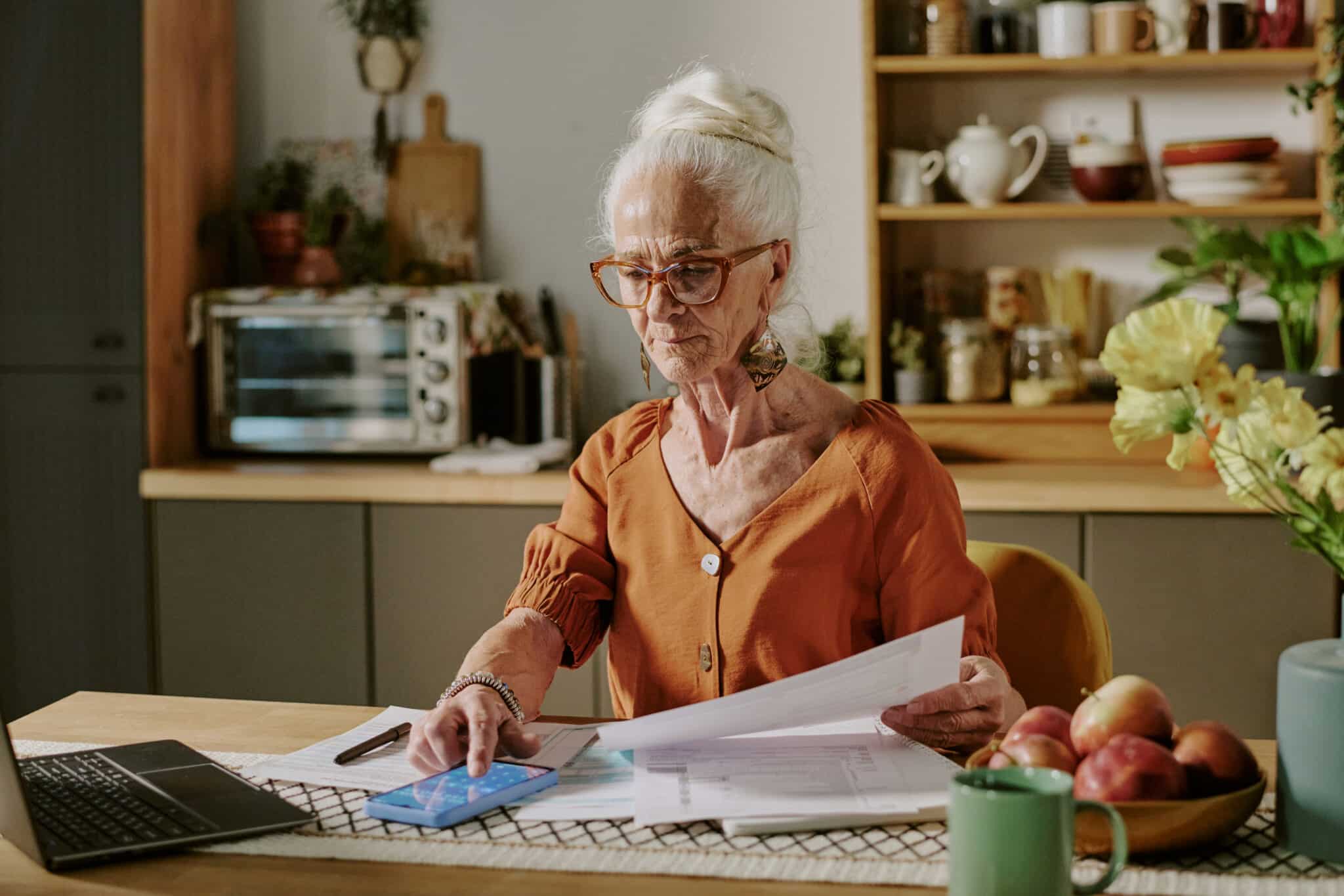 Home 13 Senior-Woman-Calculating-Assisted-Living-Costs